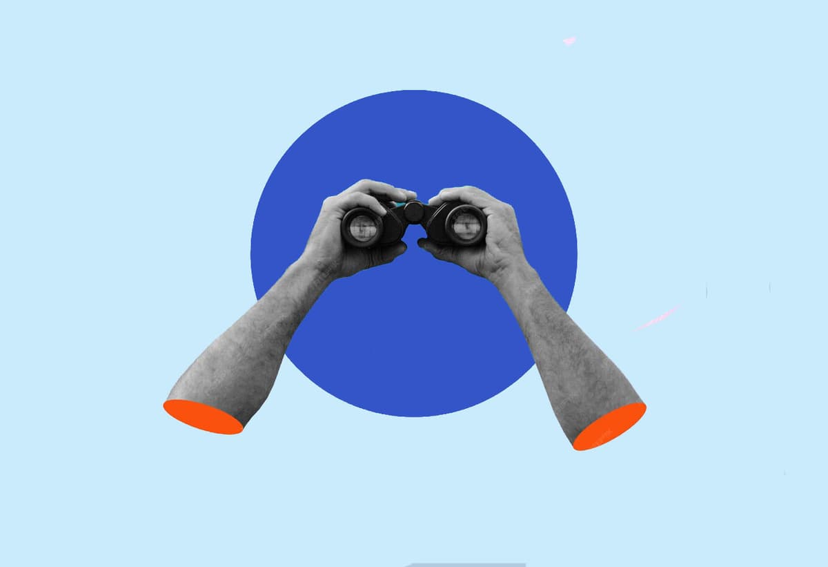 Person looking through binoculars